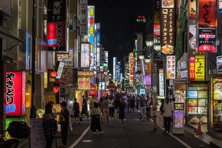neon street signs in Shinjuku Tokyo